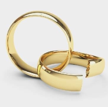 Duas alianças de casamento, uma quebrada.
