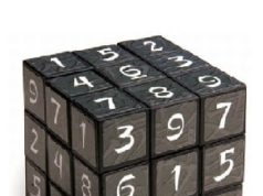 Cubo mágico contendo nove números em cada uma de suas faces